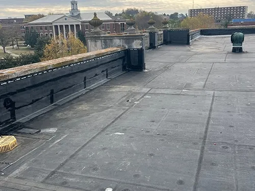 Commercial roof repair and maintenance work in progress
